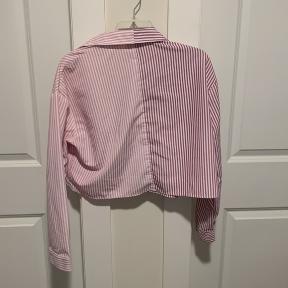 I am selling a cute and good condition pink and purple button up! - Picture 2 of 2